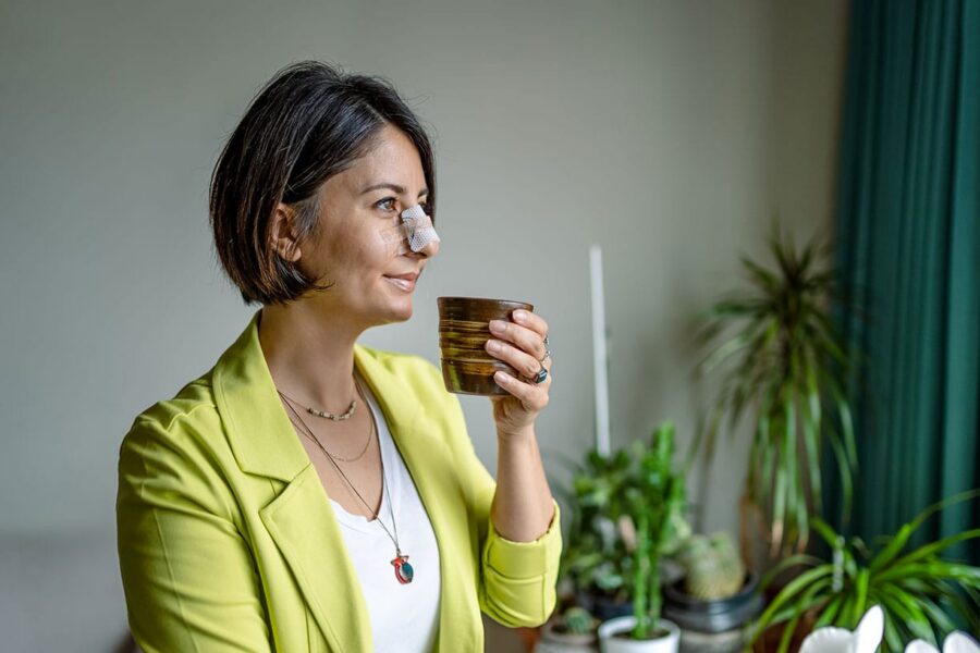 woman recovering from her rhinoplasty in Anchorage, AK